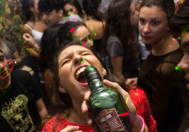 girl at party drinking
