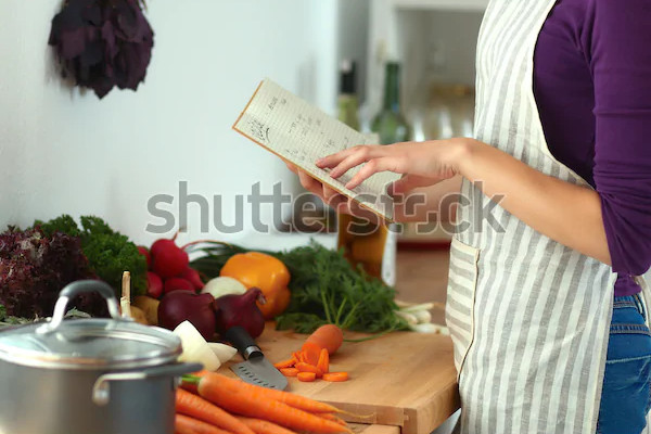 cookbook reading in kitchen